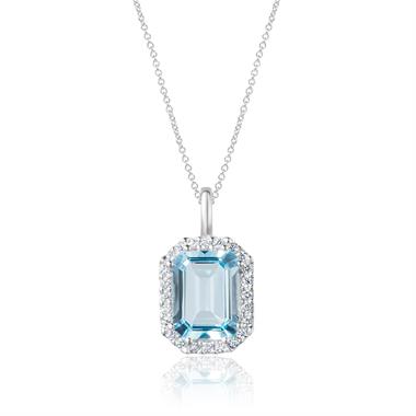 18ct White Gold Emerald Cut Blue Topaz and Diamond Halo Pendant thumbnail