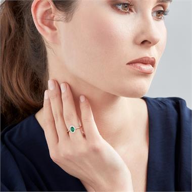 18ct Yellow Gold Oval Emerald and Diamond Halo Engagement Ring
 thumbnail