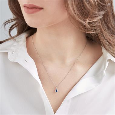 Camellia 18ct White Gold Sapphire and Diamond Teardrop Halo Pendant
 thumbnail