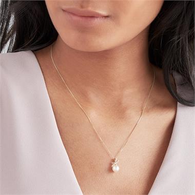 Isla 18ct Yellow Gold Bow Design Pearl and Diamond Drop Pendant thumbnail