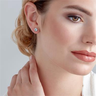 18ct White Gold Blue Topaz Rubover Stud Earrings thumbnail
