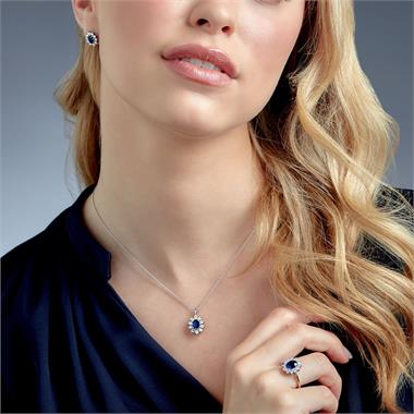 18ct White Gold Oval Sapphire and Diamond Cluster Stud Earrings thumbnail