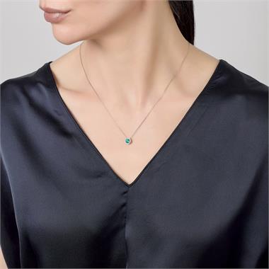 Camellia 18ct White Gold Emerald and Diamond Halo Necklace thumbnail