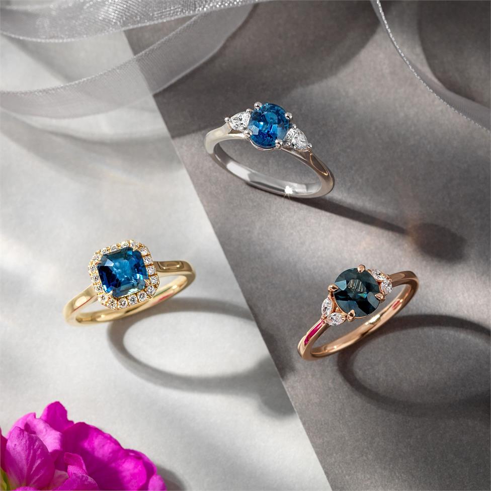 18ct Yellow Gold Radiant Cut Teal Sapphire and Diamond Halo Ring Thumbnail Image 1